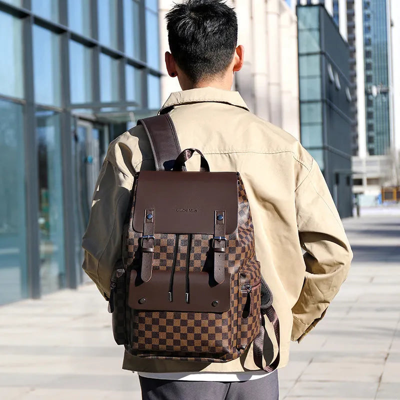 Men's plaid backpack in black and brown PU with curved shoulder straps for commute and business travel