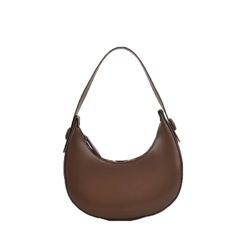 Women's retro brown PU dumpling shape shoulder bag with a front pocket shown.