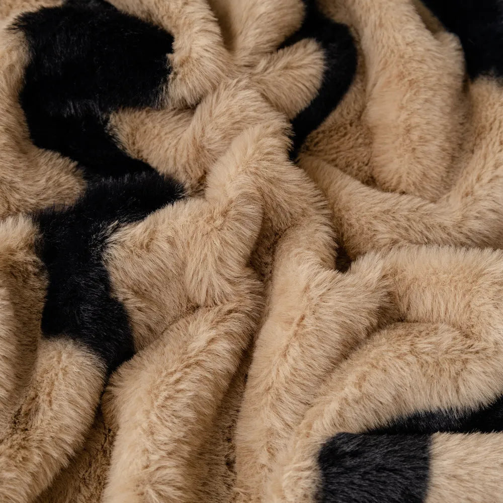 Zebra pattern flannel sofa cover with non-slip design in caramel colour showing texture and sizing