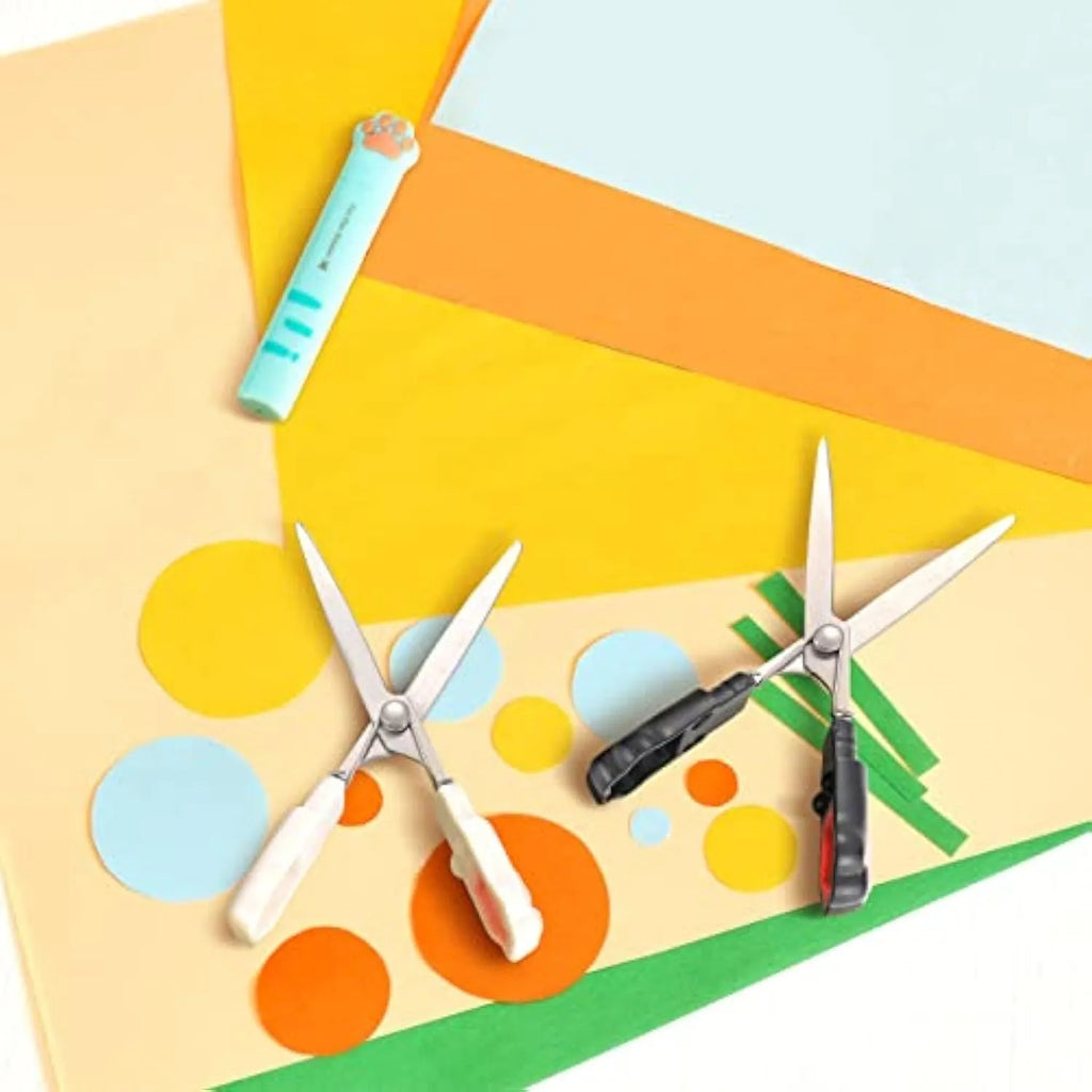 Cat paw mini folding scissors in four colours showing closed safety position and decorative handles