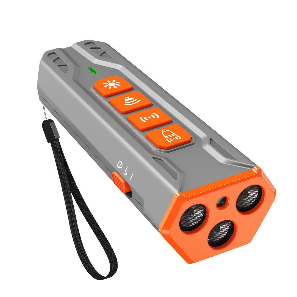Three-head ultrasonic dog trainer with remote control in black and orange colour