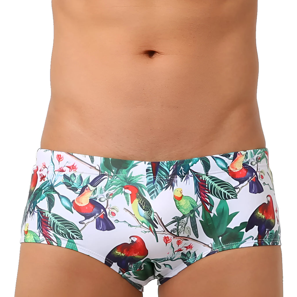Men's swimming trunks with flower-bird print pattern in nylon fabric showing briefs style