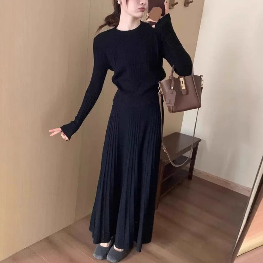 Dark grey knitted ethnic style dress suit with black collage stitching and matching skirt.