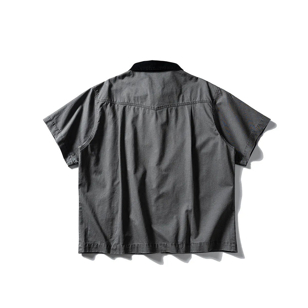 Grey loose-fit washed overalls short sleeve cardigan shirt on a hanger