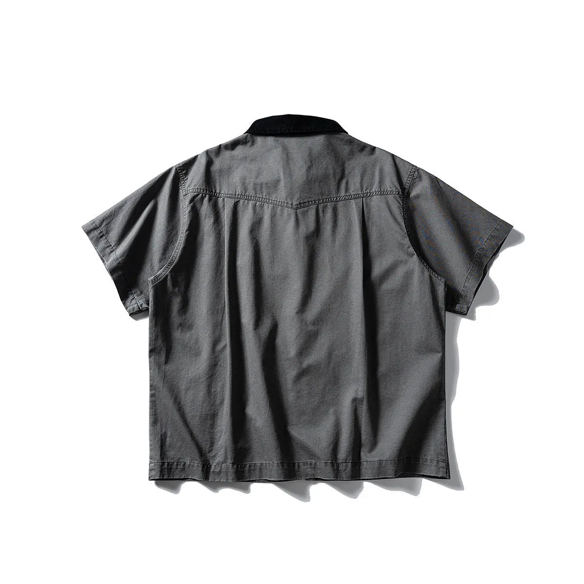 Grey loose-fit washed overalls short sleeve cardigan shirt on a hanger