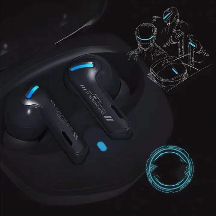 Grey QCY-G1 wireless Bluetooth gaming headset with charging case and ear tips on a table.
