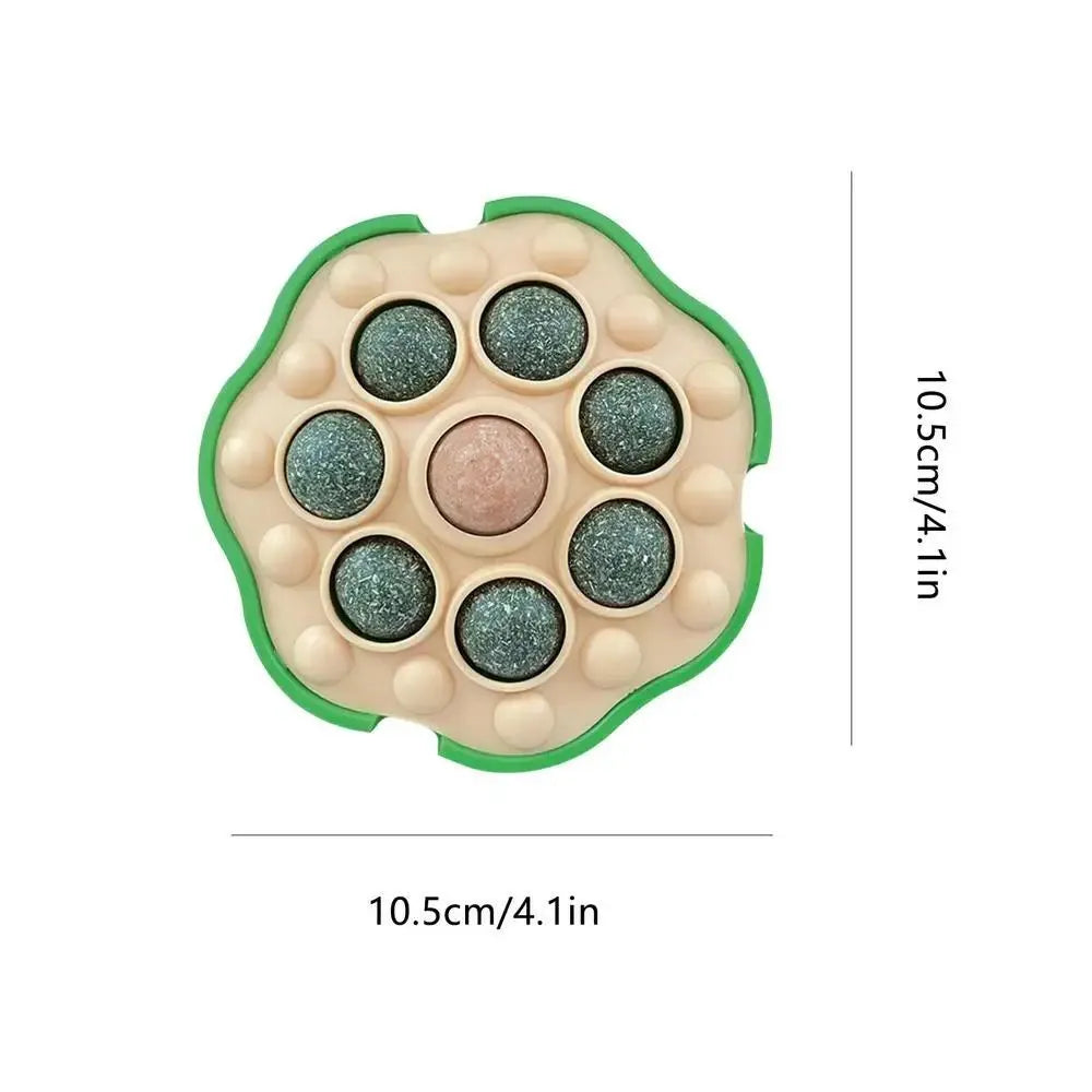 Green lotus-shaped catnip ball with stick-on wall backing for indoor cats