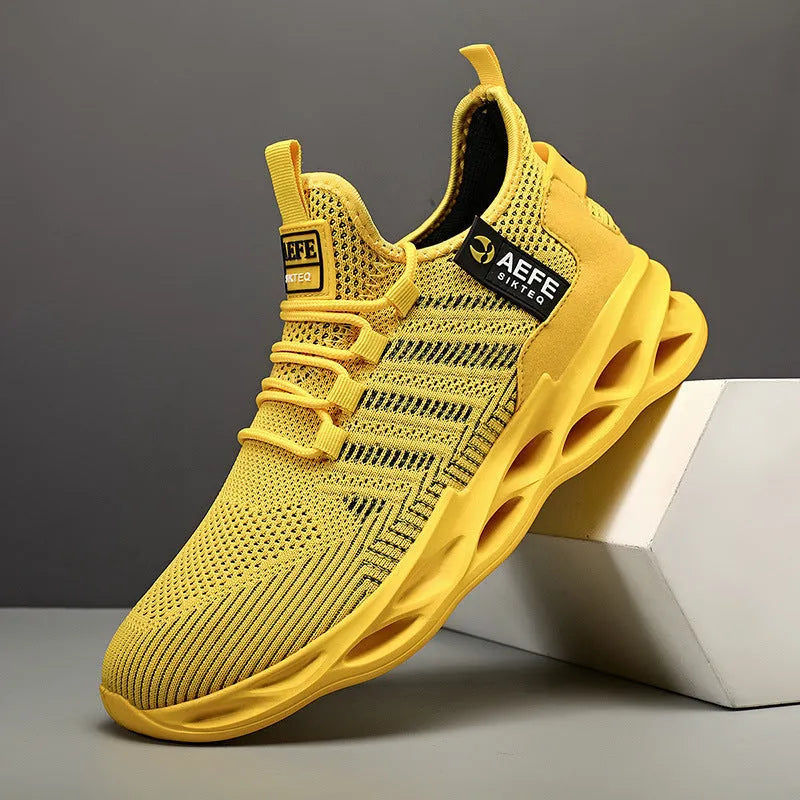 Men's mesh casual running shoes in black with cross strap detailing and lace-up closure