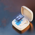 Dark night black wireless Bluetooth semi-in-ear earbuds with a digital battery display.