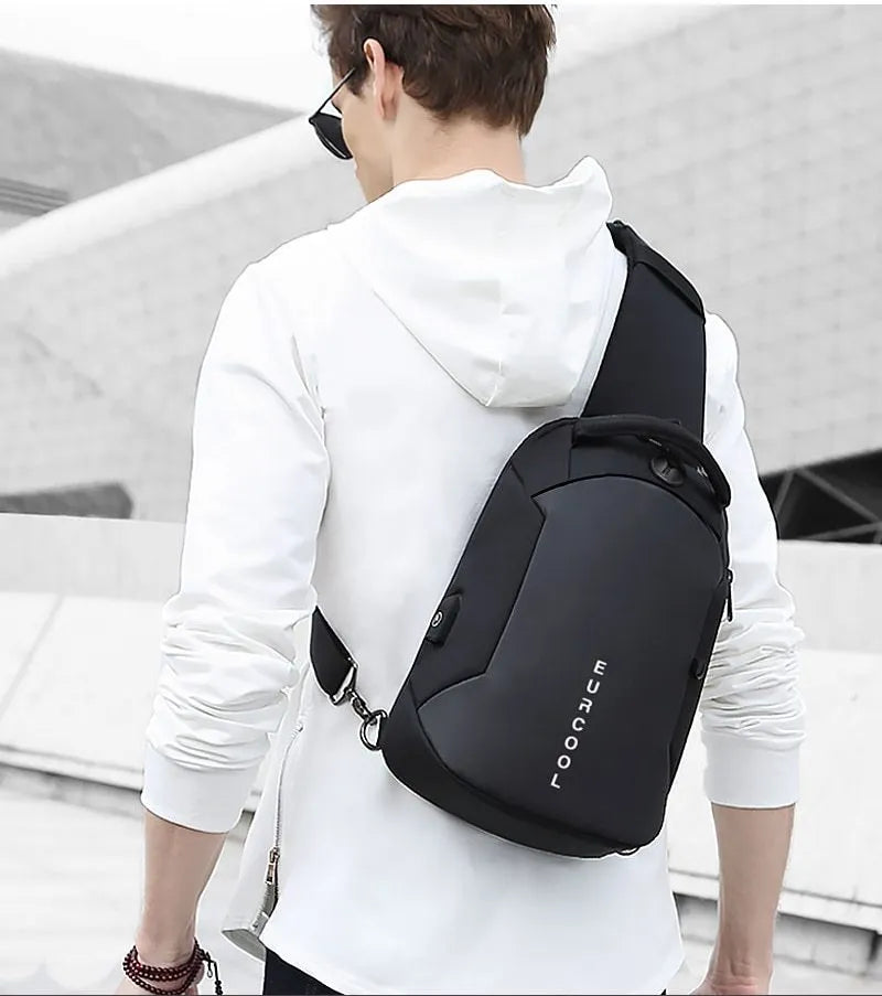 Men's black Oxford crossbody chest bag with USB charging port and multiple zippered compartments
