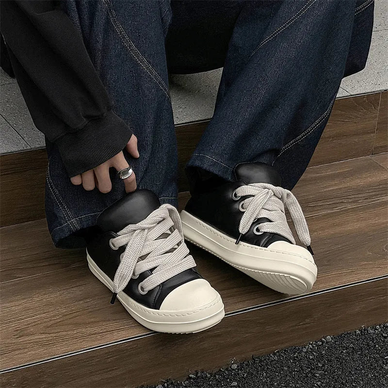 Men's black leather slip-on casual shoes with round toe and rubber sole