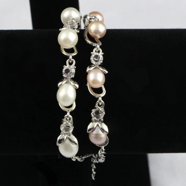 Freshwater pearl bracelet with Korean crown design alloy closure on display