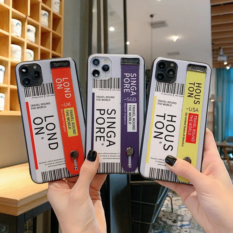 iPhone mobile phone case with TPU PC construction and detachable wristband in red violet yellow colour options