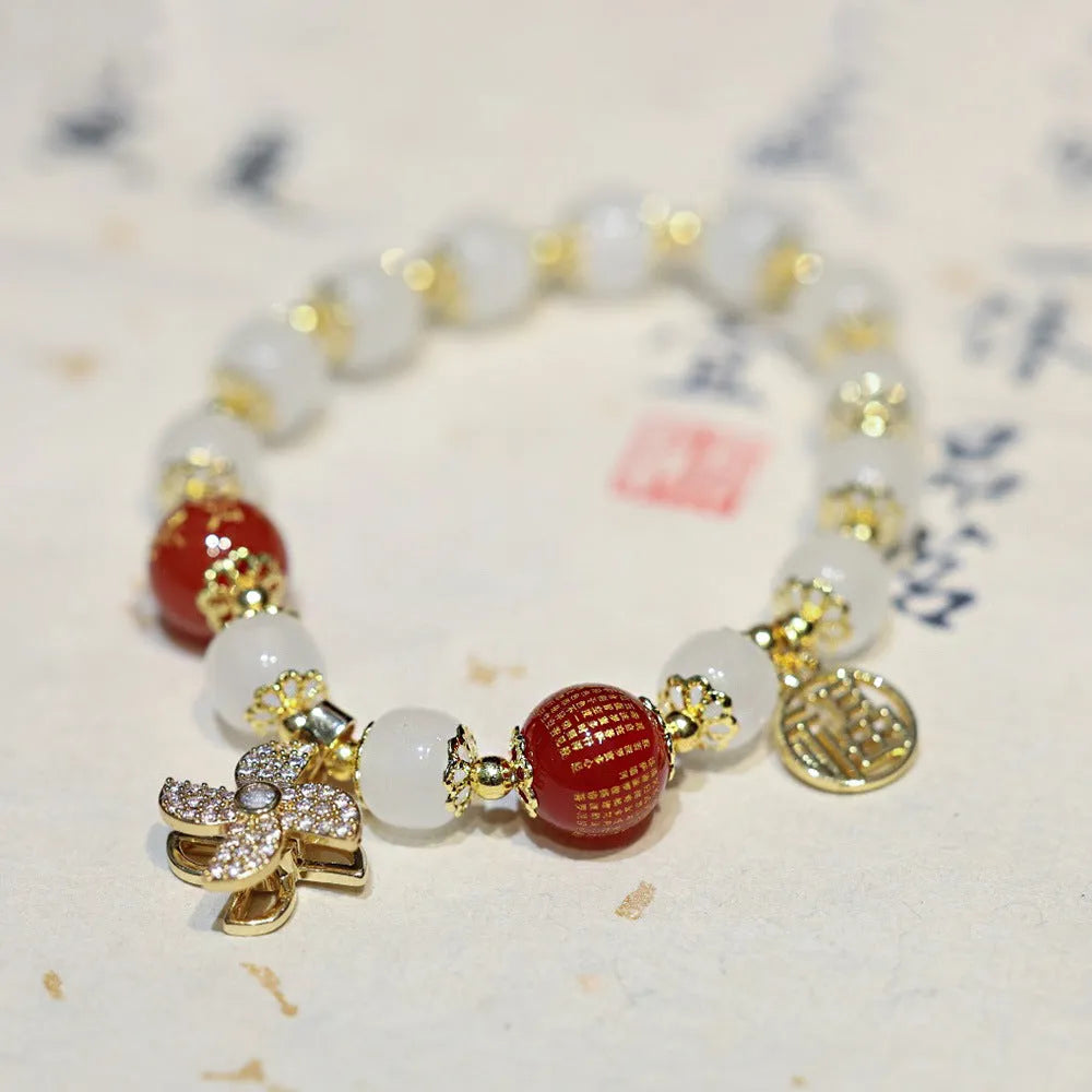 Chinese style women's coloured glaze bracelet with safety lock, windmill and bamboo charms