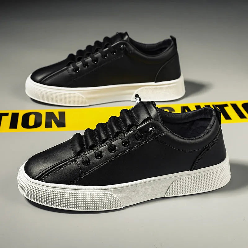 Men's black and white low top sports shoes with synthetic leather upper, mesh panels, and a flat PVC sole.