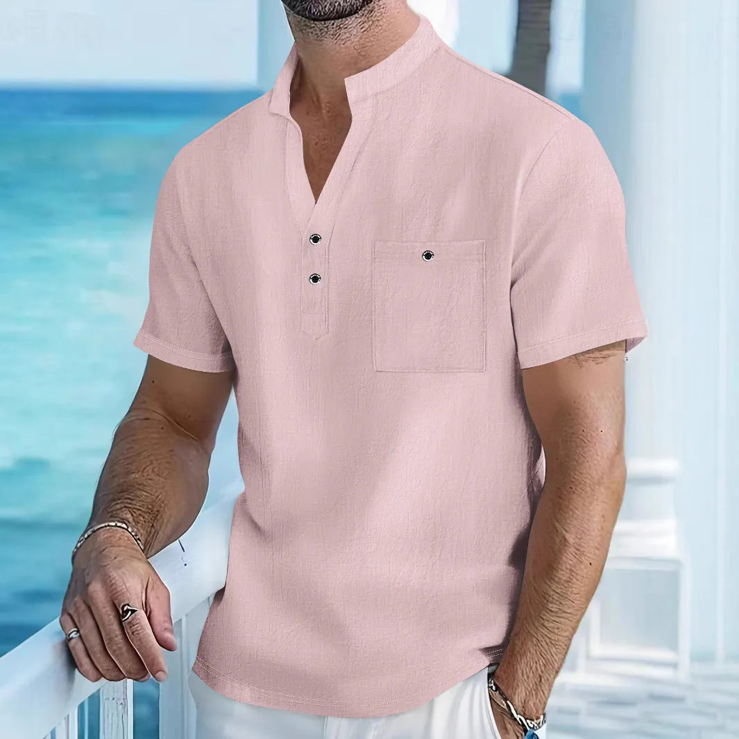 Men's loose fit linen T-shirt with a stand collar and short sleeves in a light blue colour.