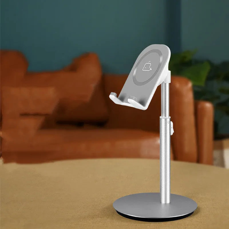 Silver metal desktop phone and tablet holder model S1 on a desk, showing a device held upright.
