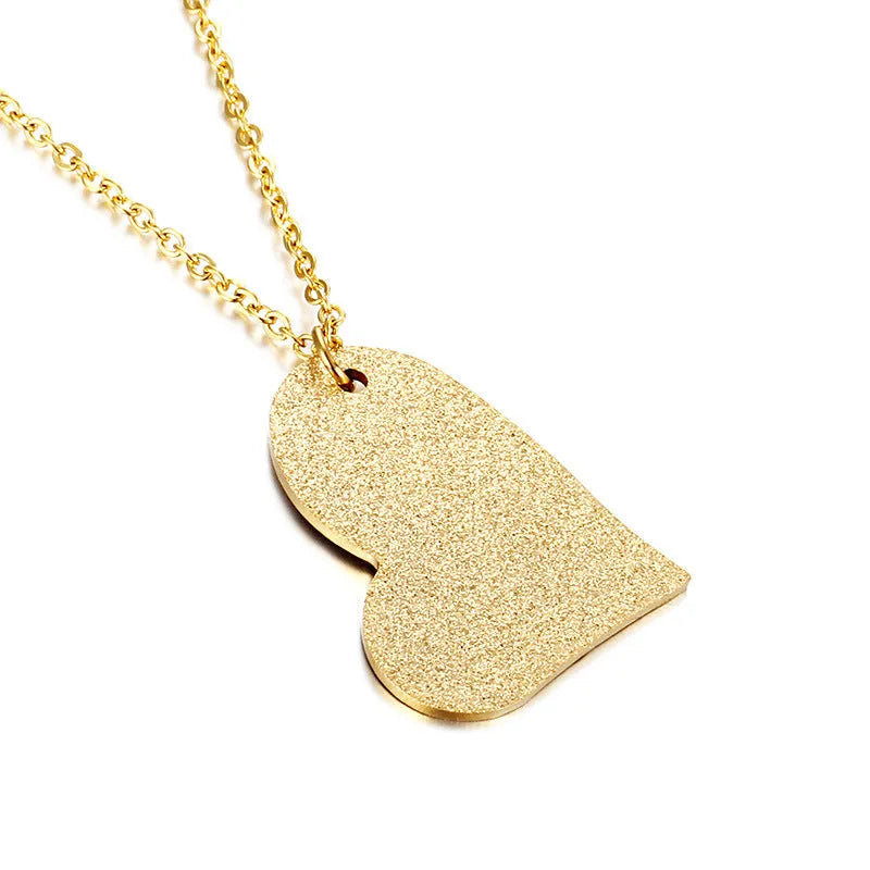 Geometric titanium steel pendant necklace with a heart-shaped neckline design in a metallic finish.