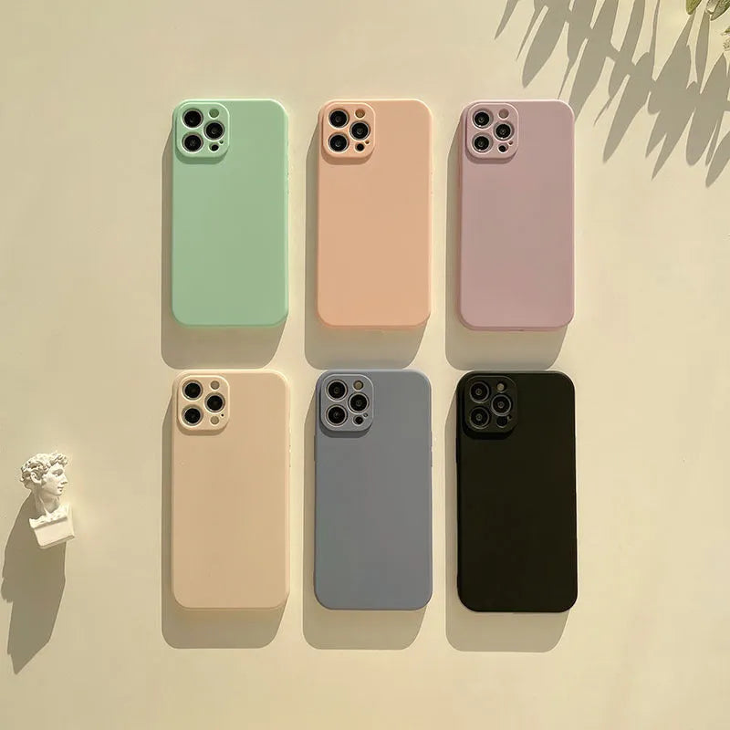 Frosted solid colour TPU phone case for iPhone 14 models shown in various colours.