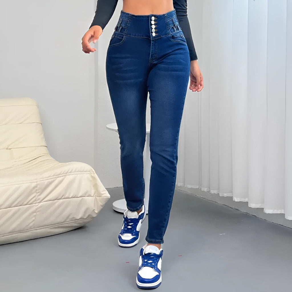 Dark blue women's straight-leg denim trousers with breasted zip and button front fastening.