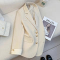 Korean style loose fit women's coat in milky white, showing front view with pockets.