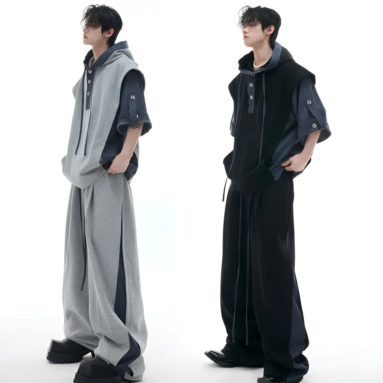 Men's grey hooded sports jacket and matching trousers with three-dimensional stitching detail.