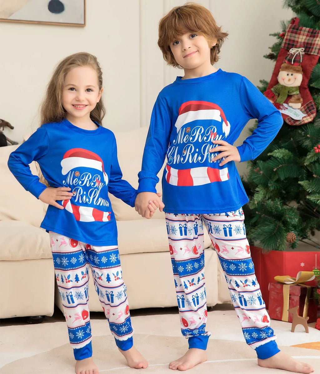Matching family Christmas pyjamas set with letter print top and plaid pants in adult, child, baby, and dog sizes