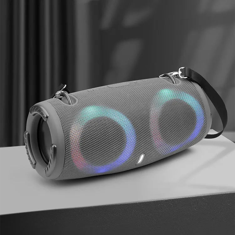 Portable war drum design Bluetooth speaker with RGB coloured lights in blue, black, red, silver grey, or camouflage.