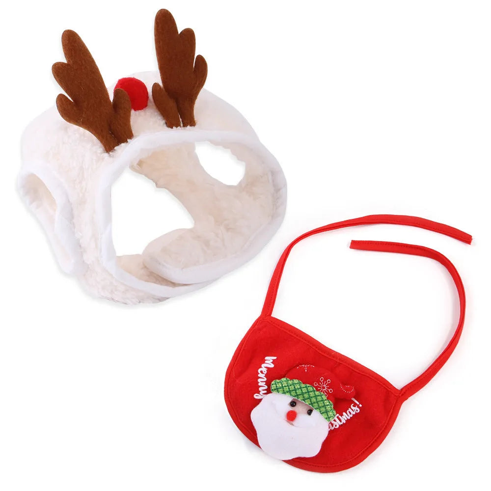 Christmas pet costume with white reindeer antler hat and green velvet bib on small pet