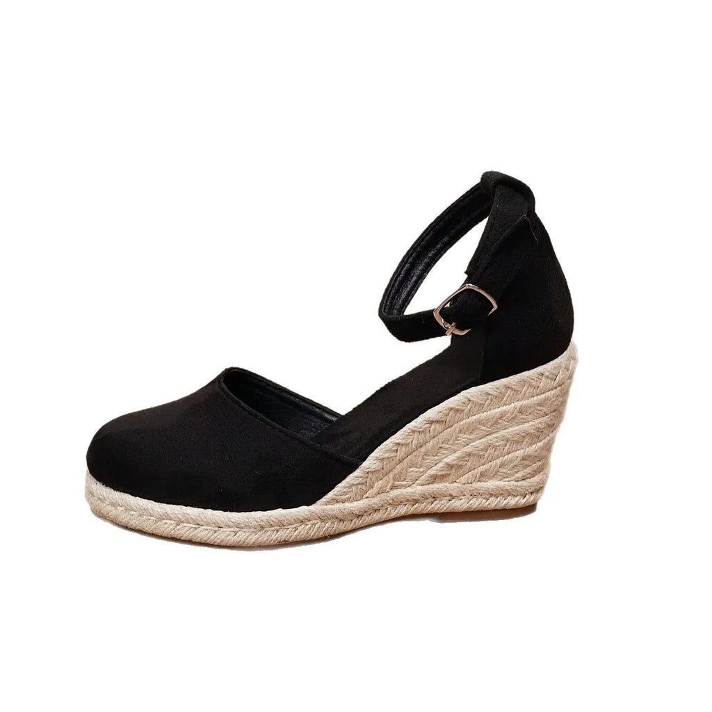 Women's apricot Roman-style canvas wedge sandals with suede upper and buckle closure