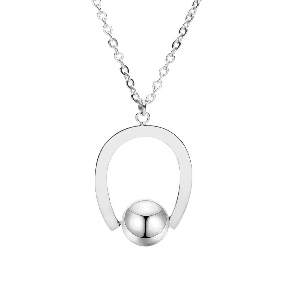 Adjustable stainless steel necklace with a geometric pendant in a gold electroplated finish.