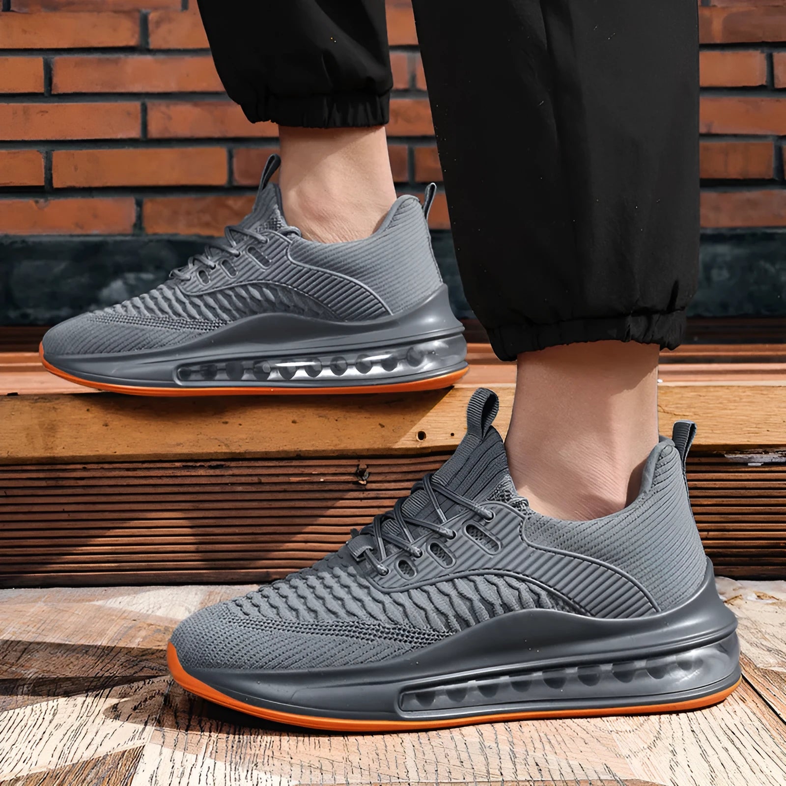 Men's low-top black mesh running shoes with rubber sole and lace-up front