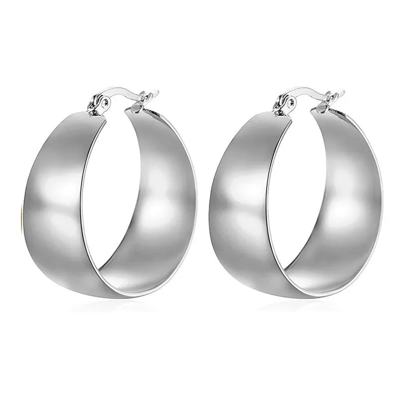 Stainless steel widened curved earrings in gold or steel colour, 25mm or 30mm sizes