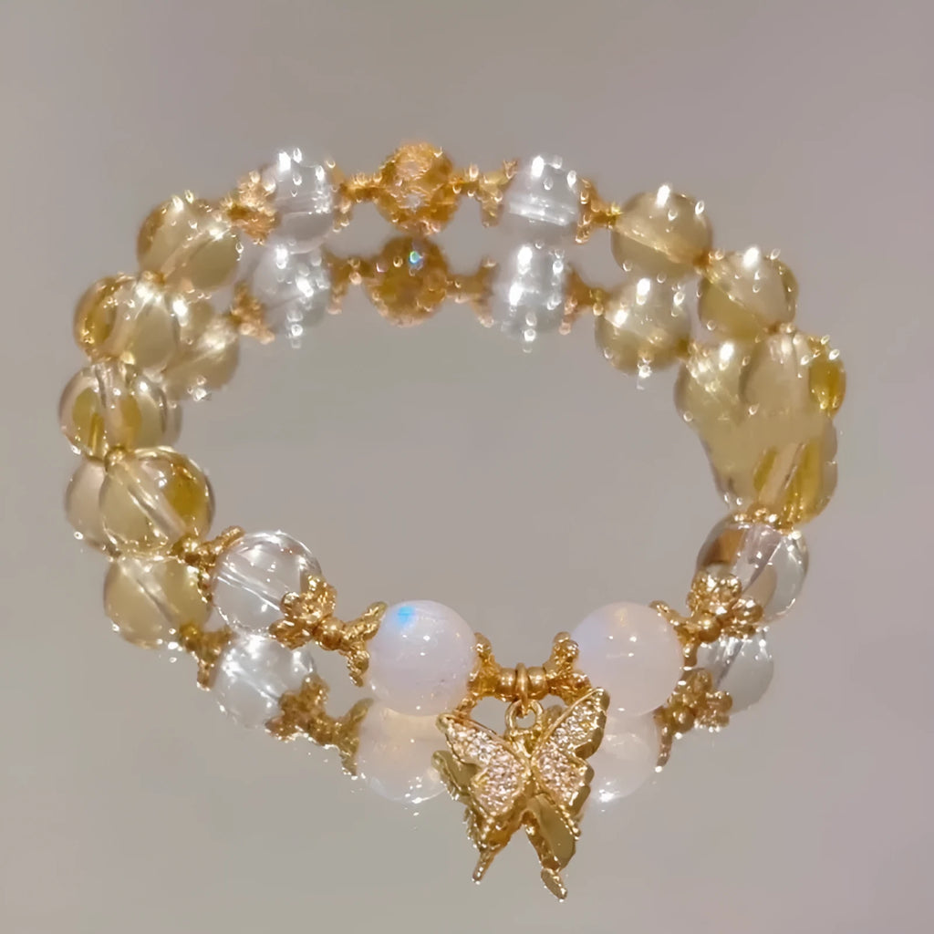 Women's Moonstone White crystal bracelet with diamond-shaped beads and a butterfly charm in Chinese style.