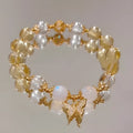 Women's Moonstone White crystal bracelet with diamond-shaped beads and a butterfly charm in Chinese style.