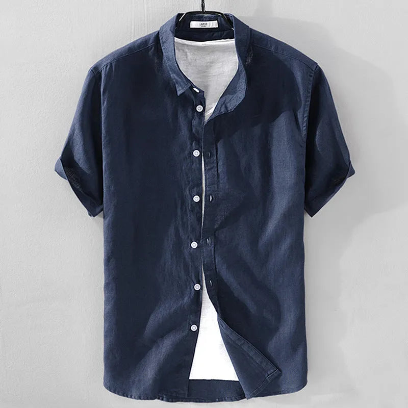 Men's short sleeve loose fit linen shirt in a cotton blend fabric, shown in a solid colour.