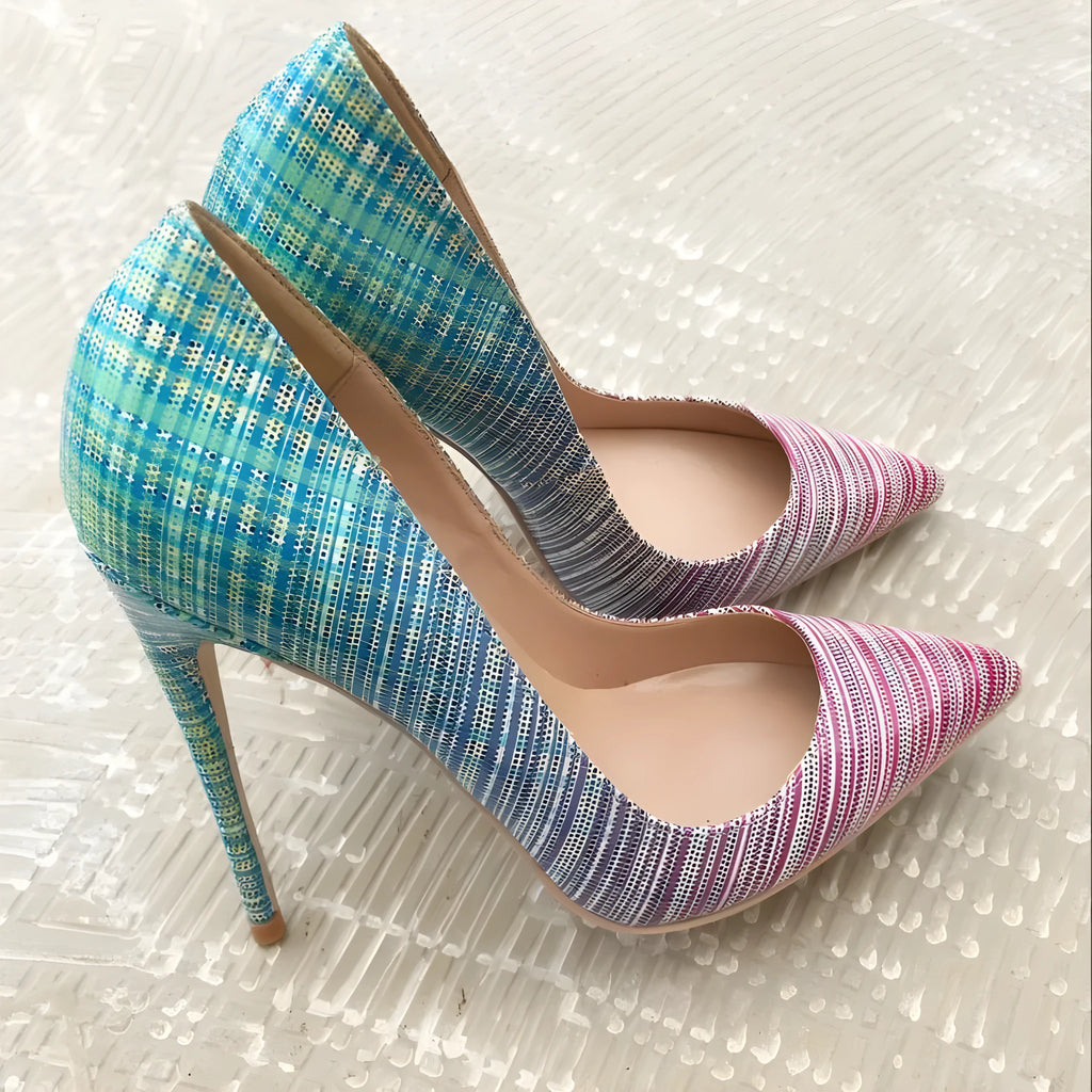 Women's pink and blue gradient patent leather pointed toe stiletto heels on a white background