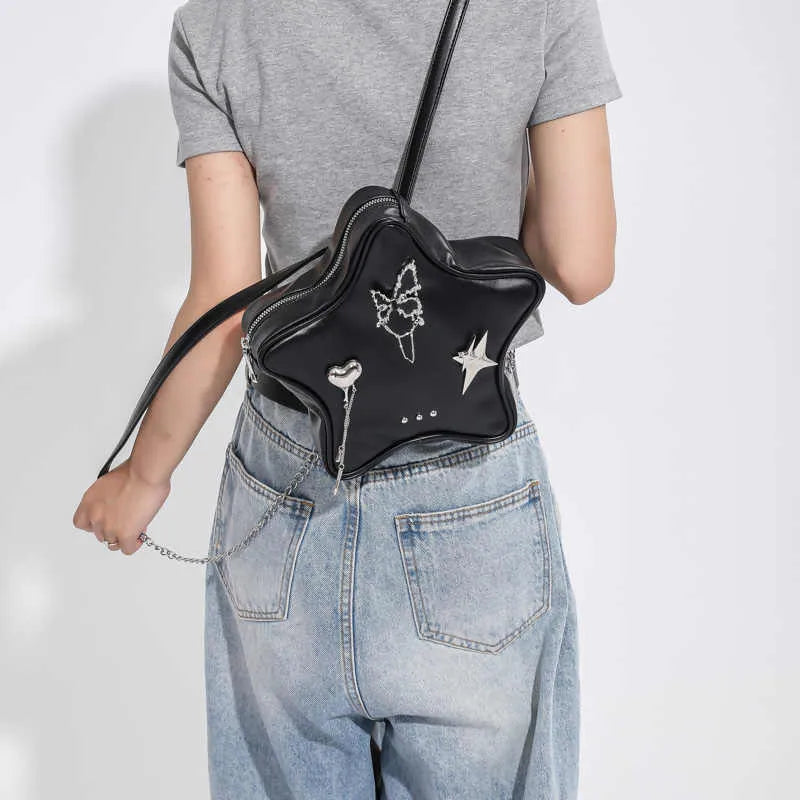 Women's soft PU messenger bag mini backpack in black with adjustable shoulder strap for cross-body or single shoulder wear