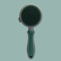 Green and pink two-sided pet grooming brush with retractable slicker and silicone massager