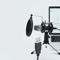 Black condenser microphone with aluminium stand for mobile streaming and live broadcast