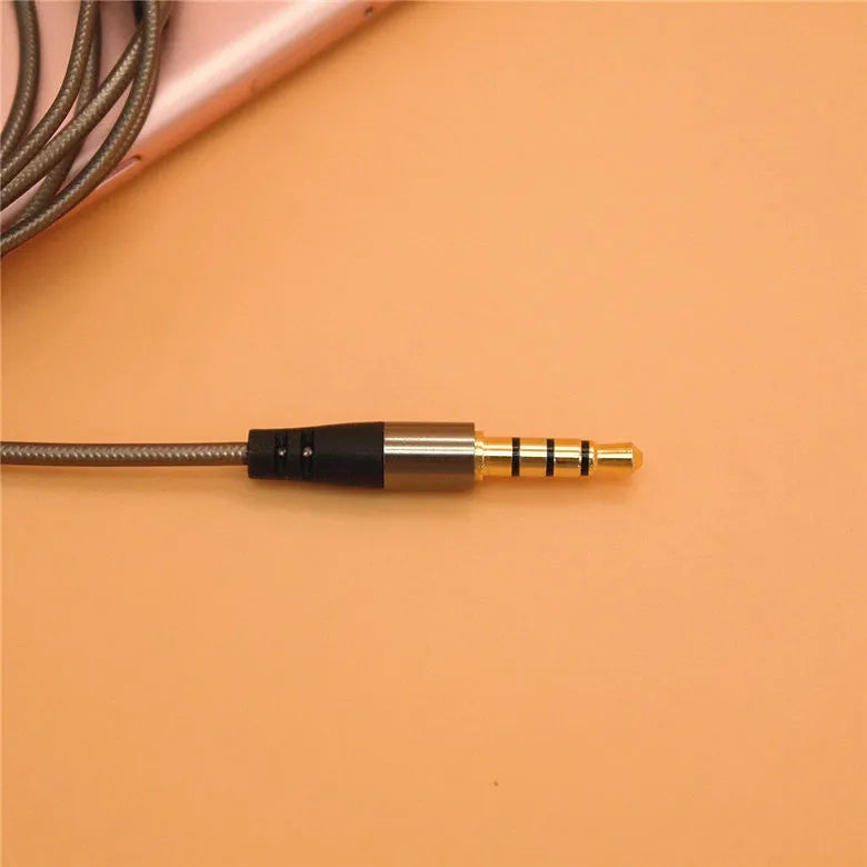Titanium grey metal in-ear earphones with a detachable TPE cable and aluminium foil shielding.