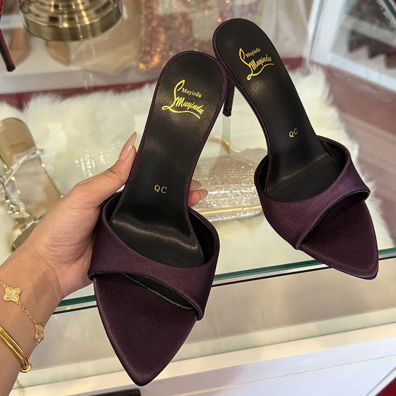 Women's black patent leather pointed toe sandals with an 8cm stiletto heel and ankle strap.