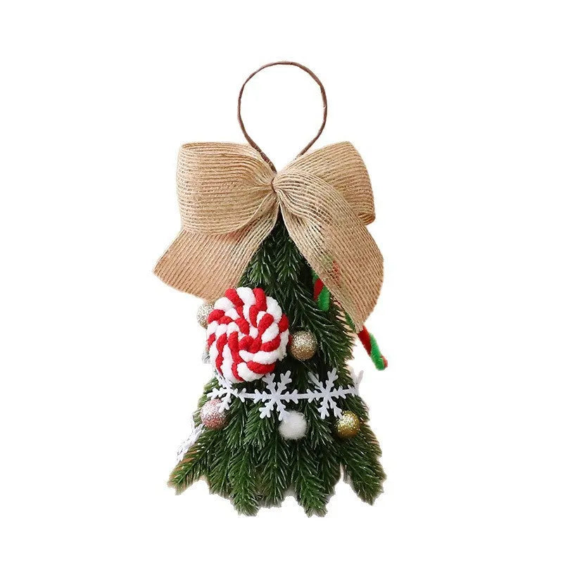 21cm PE foam mini Christmas tree ornament with red and white snowflake design, hanging on a tree branch