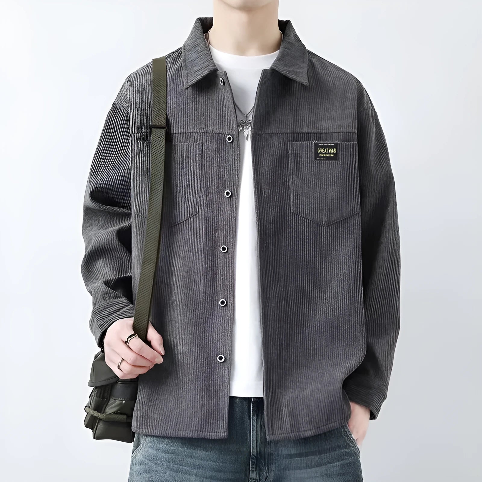 Men's corduroy cardigan style jacket in black, dark grey, khaki, or orange, with long sleeves and ribbed texture.