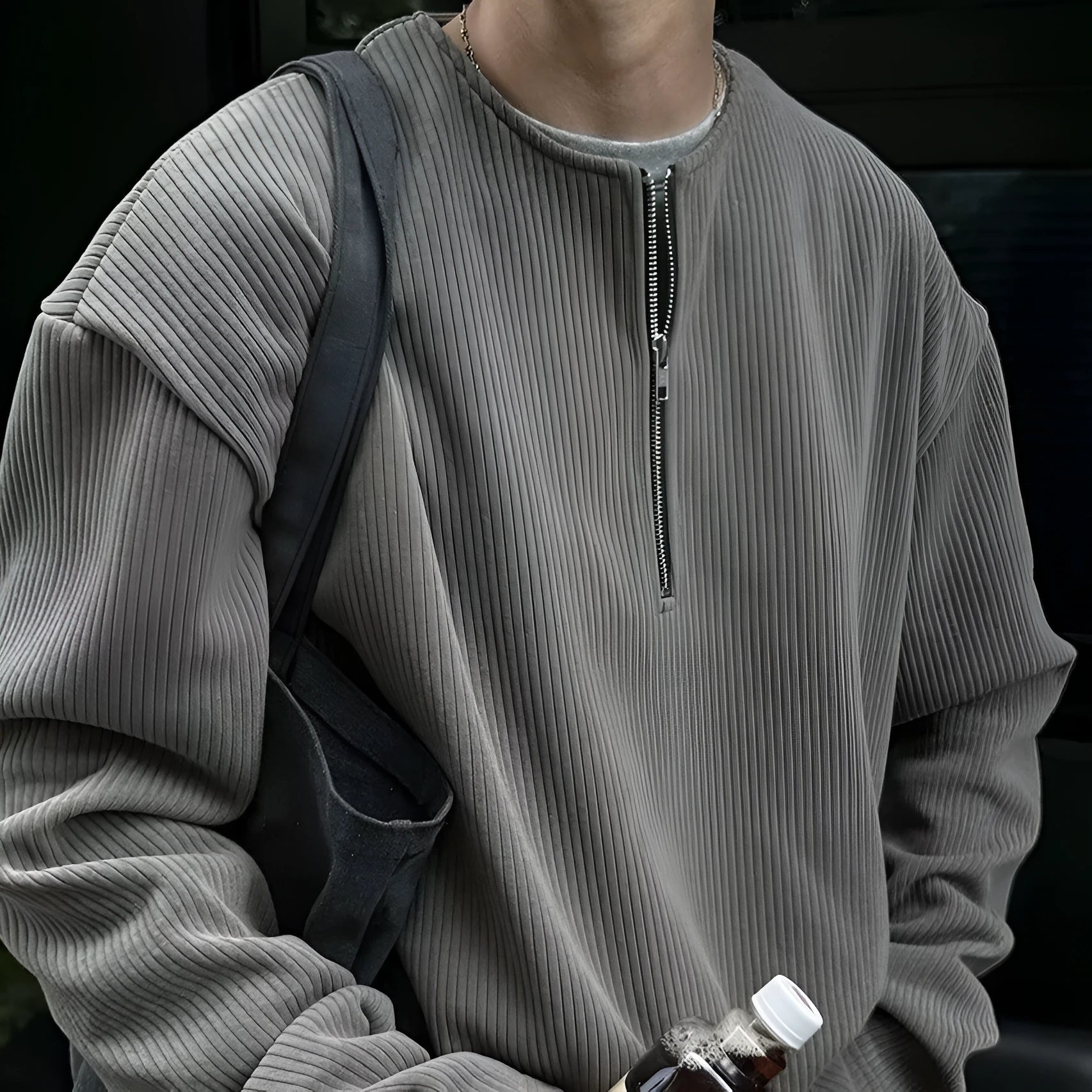 Women's solid colour loose long sleeve pullover top in grey, black, or apricot with letter pattern.