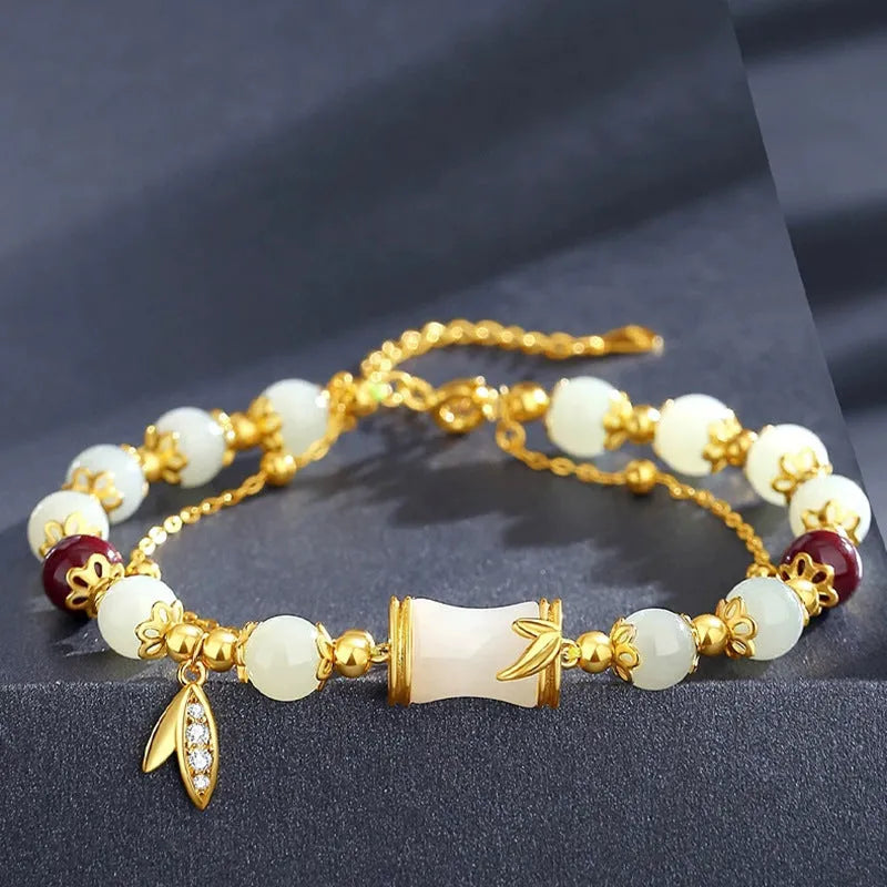 Retro bamboo design bracelet with flower shape and Ruyi elements in coloured glaze construction