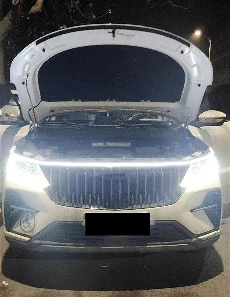 Car daytime running light strip in silicone housing, shown in white, ice blue, and red colour options.