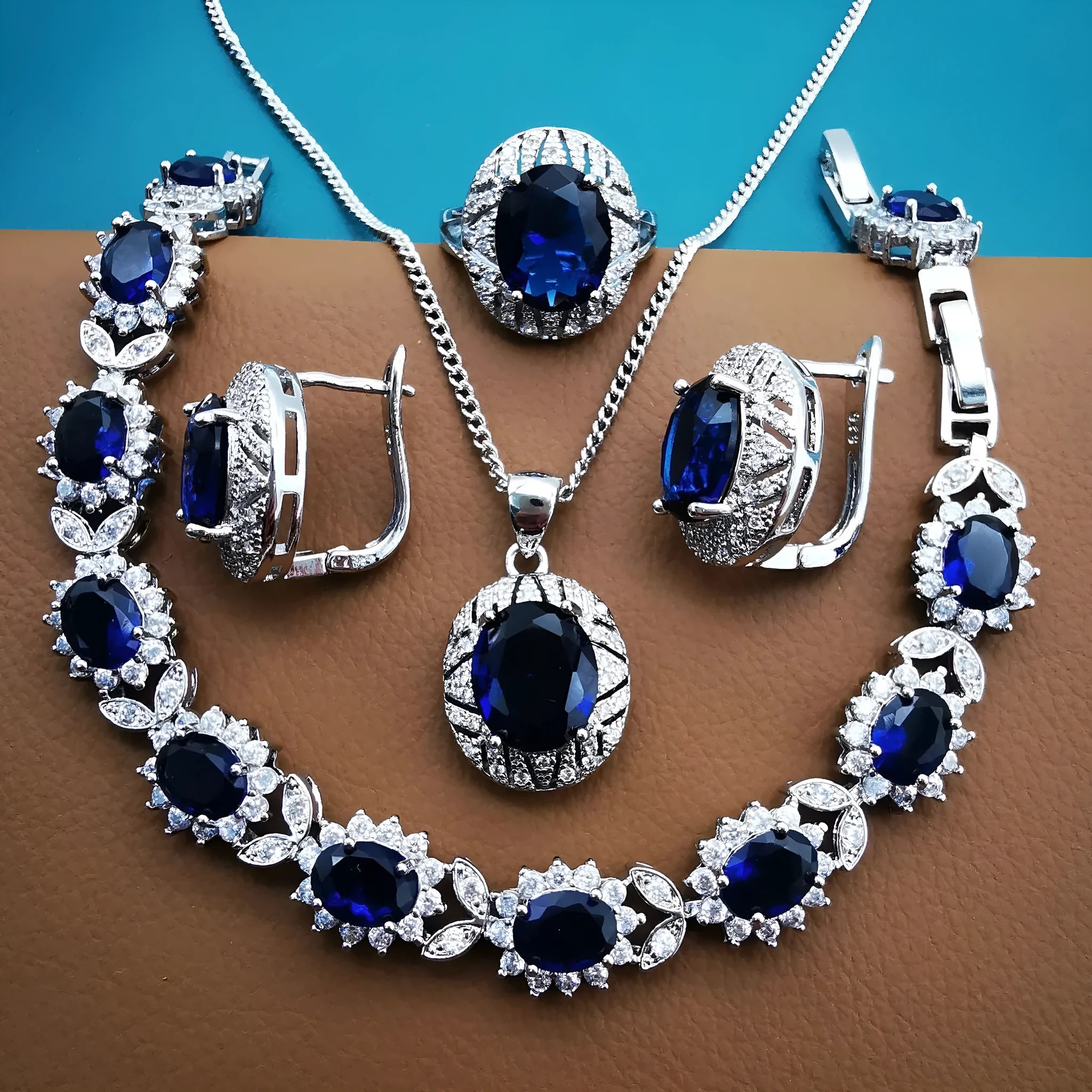 Four-piece mixed gem inlaid jewellery suit with zircon mosaic and O-ring chain in black, red, blue, green