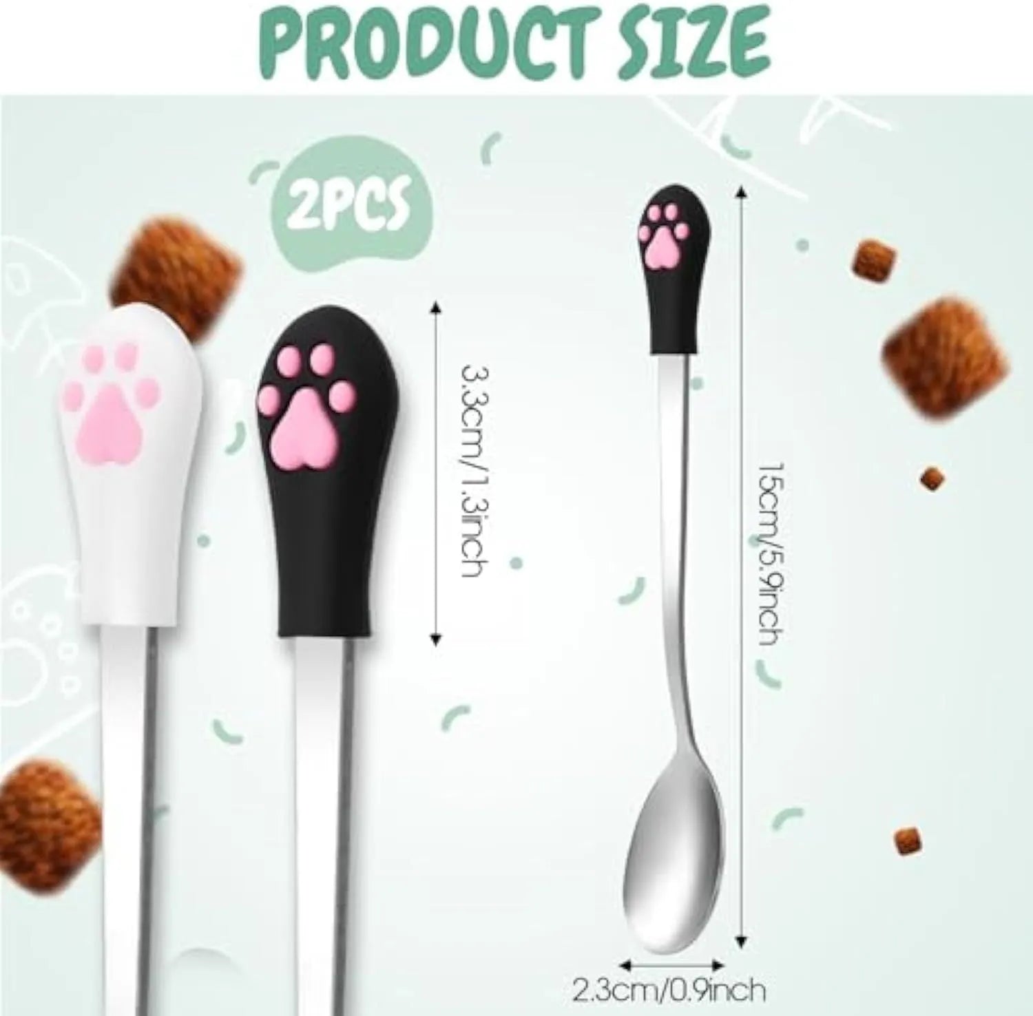 White and black stainless steel pet food spoons with cat paw design and silicone handles