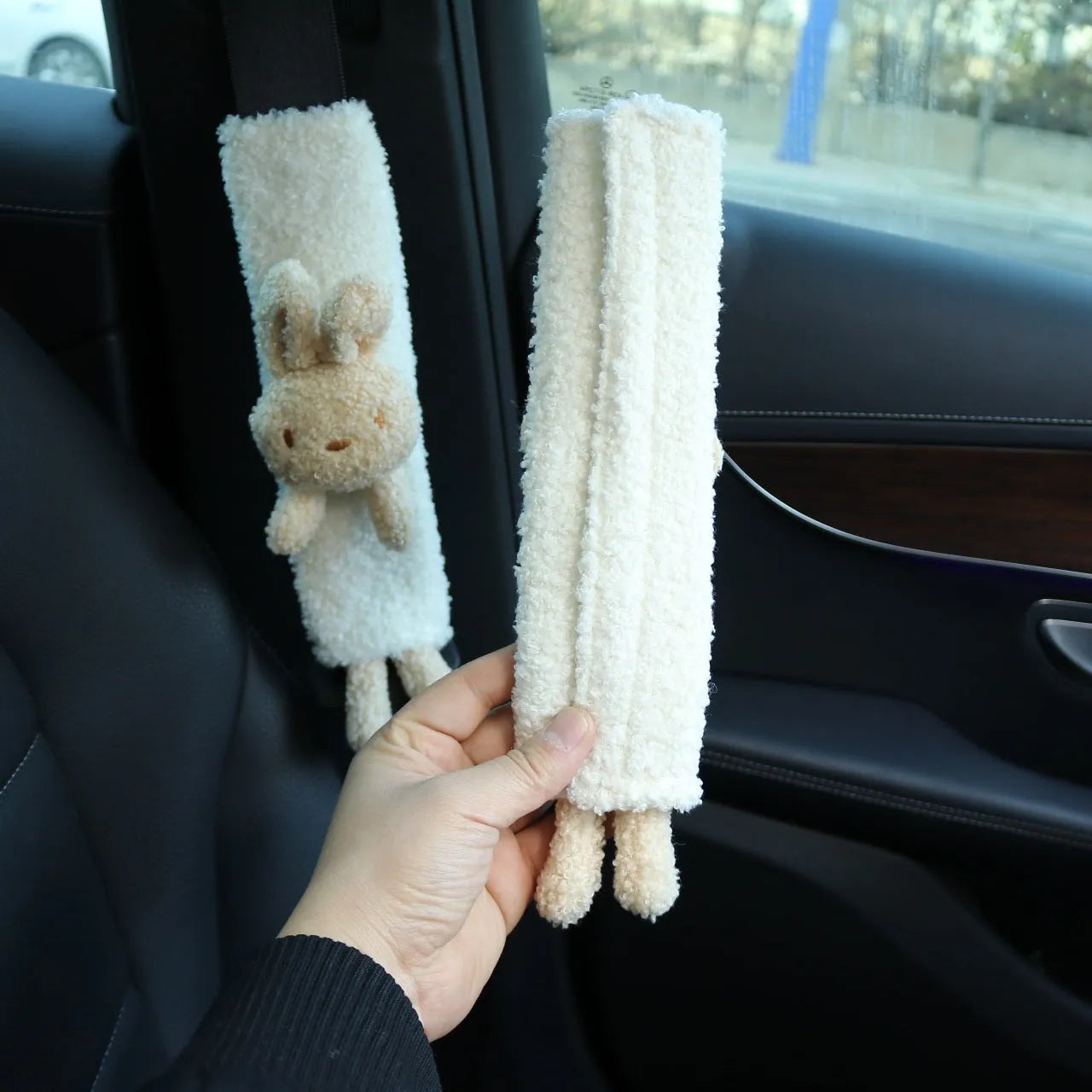 Cartoon plush lamb wool car seat belt shoulder protector in bear and rabbit designs.